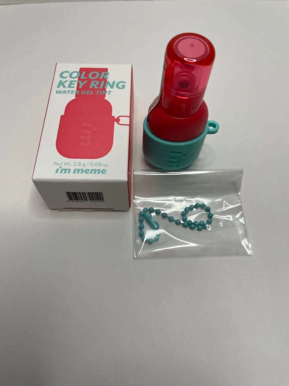 NIB Meme Color Key Ring Water Gel Tint in Red with Teal Holder. Pink Attack #07 - Picture 1 of 3